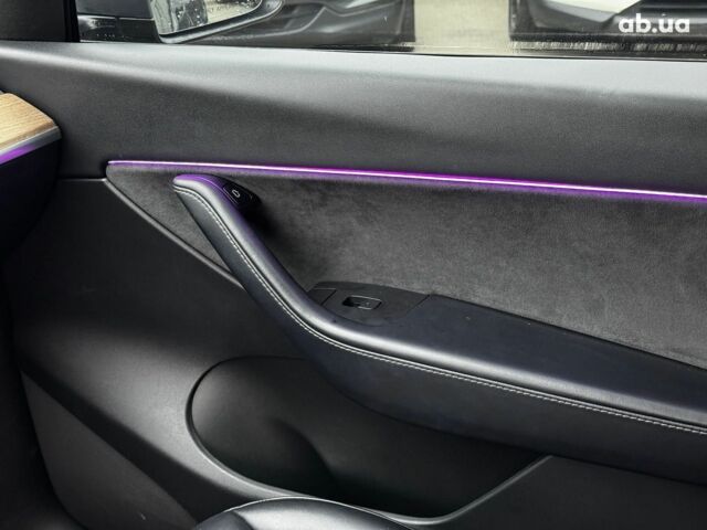 Серый Тесла Model Y, объемом двигателя 0 л и пробегом 98 тыс. км за 29490 $, фото 13 на Automoto.ua