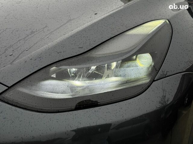 Серый Тесла Model Y, объемом двигателя 0 л и пробегом 98 тыс. км за 29490 $, фото 22 на Automoto.ua