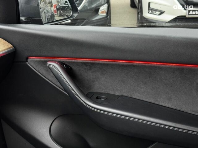 Серый Тесла Model Y, объемом двигателя 0 л и пробегом 98 тыс. км за 29490 $, фото 14 на Automoto.ua