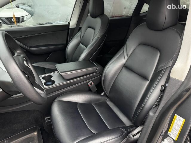 Серый Тесла Model Y, объемом двигателя 0 л и пробегом 98 тыс. км за 29490 $, фото 12 на Automoto.ua