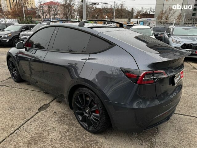 Серый Тесла Model Y, объемом двигателя 0 л и пробегом 98 тыс. км за 29490 $, фото 3 на Automoto.ua