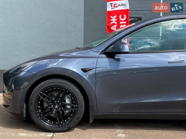 Серый Тесла Model Y, объемом двигателя 0 л и пробегом 123 тыс. км за 23999 $, фото 4 на Automoto.ua