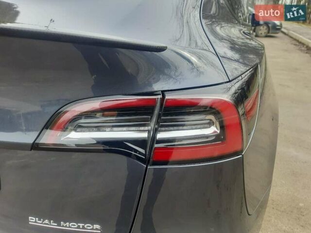 Серый Тесла Model Y, объемом двигателя 0 л и пробегом 48 тыс. км за 24900 $, фото 1 на Automoto.ua