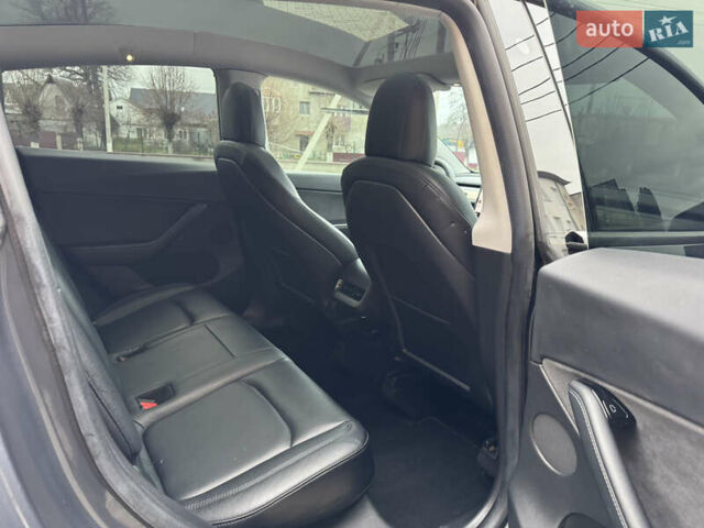 Серый Тесла Model Y, объемом двигателя 0 л и пробегом 170 тыс. км за 19500 $, фото 28 на Automoto.ua