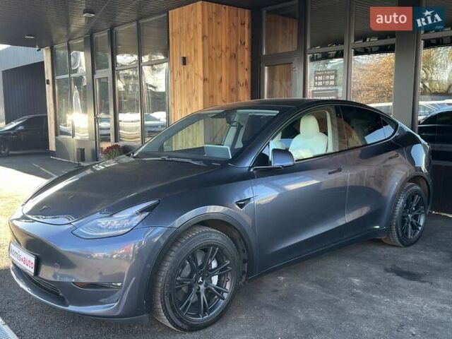 Серый Тесла Model Y, объемом двигателя 0 л и пробегом 81 тыс. км за 22099 $, фото 5 на Automoto.ua