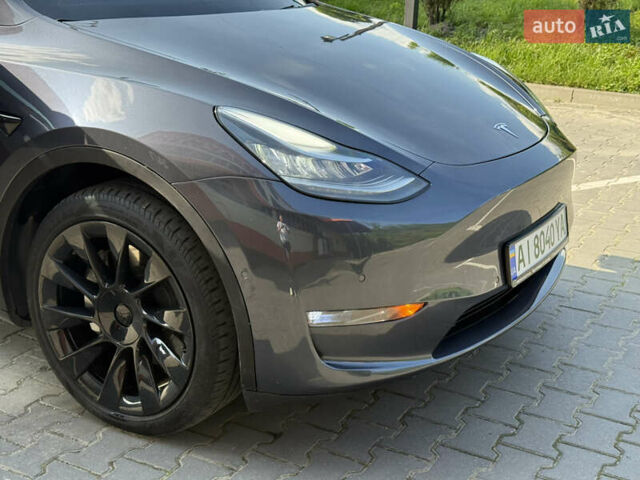 Серый Тесла Model Y, объемом двигателя 0 л и пробегом 104 тыс. км за 22500 $, фото 5 на Automoto.ua