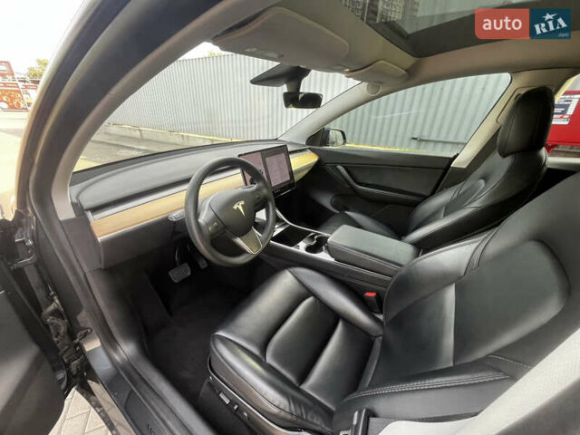 Серый Тесла Model Y, объемом двигателя 0 л и пробегом 137 тыс. км за 22900 $, фото 7 на Automoto.ua