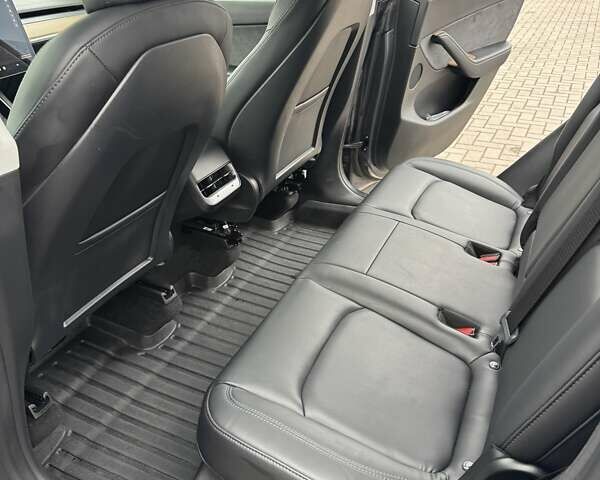 Серый Тесла Model Y, объемом двигателя 0 л и пробегом 63 тыс. км за 23900 $, фото 9 на Automoto.ua