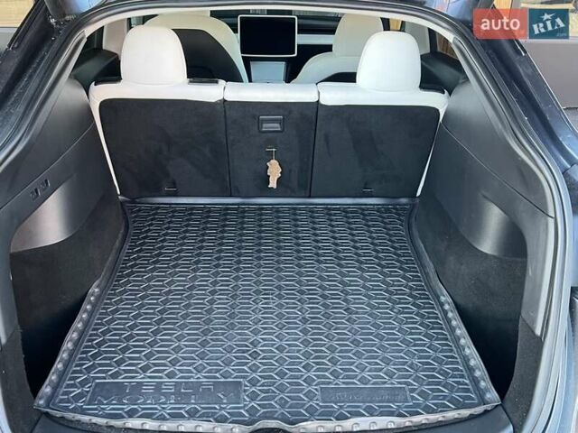 Серый Тесла Model Y, объемом двигателя 0 л и пробегом 81 тыс. км за 22099 $, фото 38 на Automoto.ua