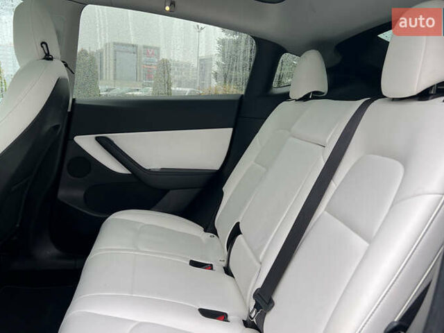 Сірий Тесла Model Y, об'ємом двигуна 0 л та пробігом 76 тис. км за 26850 $, фото 21 на Automoto.ua