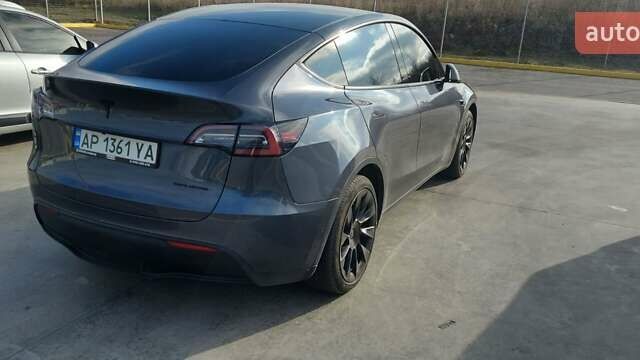 Серый Тесла Model Y, объемом двигателя 0 л и пробегом 122 тыс. км за 21500 $, фото 2 на Automoto.ua