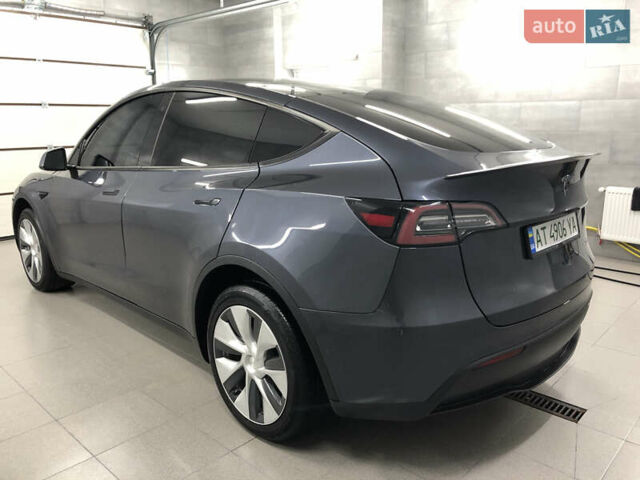 Серый Тесла Model Y, объемом двигателя 0 л и пробегом 12 тыс. км за 28500 $, фото 10 на Automoto.ua