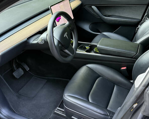 Серый Тесла Model Y, объемом двигателя 0 л и пробегом 61 тыс. км за 23200 $, фото 11 на Automoto.ua