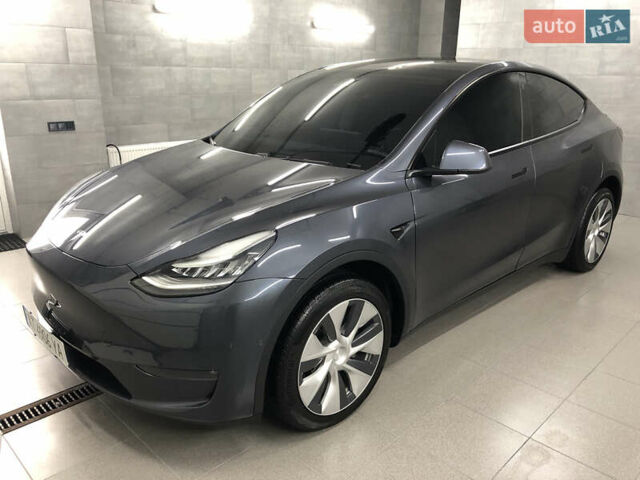 Серый Тесла Model Y, объемом двигателя 0 л и пробегом 12 тыс. км за 28500 $, фото 3 на Automoto.ua