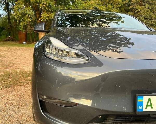 Серый Тесла Model Y, объемом двигателя 0 л и пробегом 52 тыс. км за 34000 $, фото 3 на Automoto.ua
