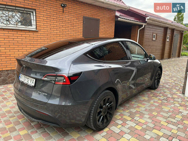 Серый Тесла Model Y, объемом двигателя 0 л и пробегом 41 тыс. км за 28500 $, фото 3 на Automoto.ua