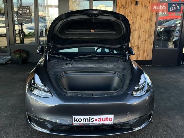 Серый Тесла Model Y, объемом двигателя 0 л и пробегом 81 тыс. км за 22099 $, фото 43 на Automoto.ua