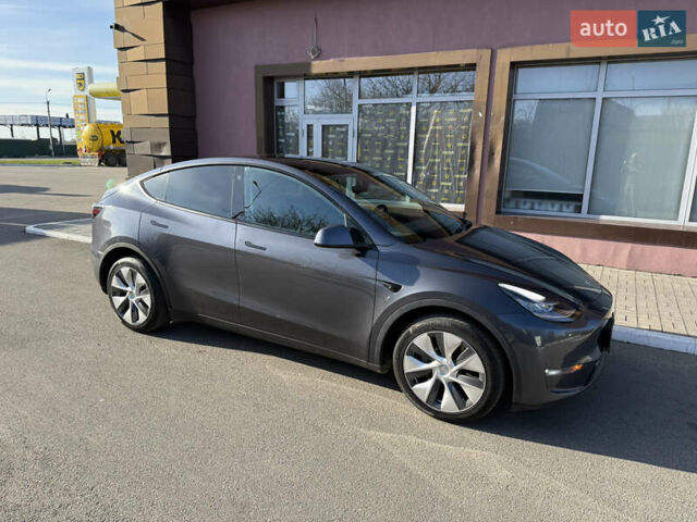 Серый Тесла Model Y, объемом двигателя 0 л и пробегом 59 тыс. км за 22300 $, фото 1 на Automoto.ua