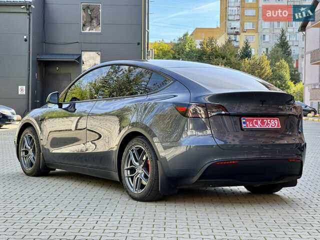 Серый Тесла Model Y, объемом двигателя 0 л и пробегом 100 тыс. км за 23000 $, фото 3 на Automoto.ua