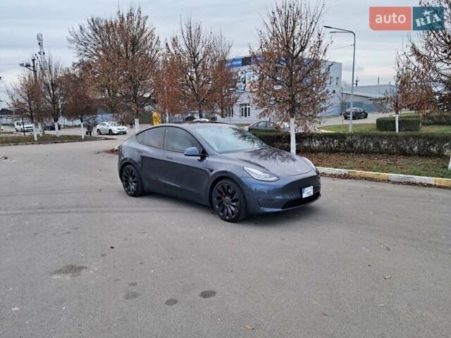 Серый Тесла Model Y, объемом двигателя 0 л и пробегом 100 тыс. км за 23500 $, фото 3 на Automoto.ua