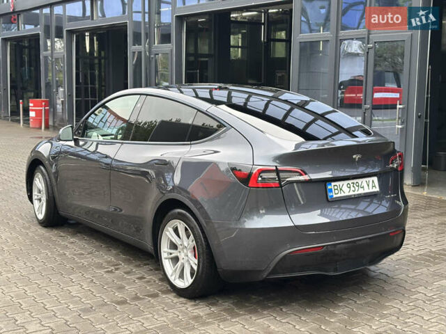Серый Тесла Model Y, объемом двигателя 0 л и пробегом 92 тыс. км за 23500 $, фото 4 на Automoto.ua
