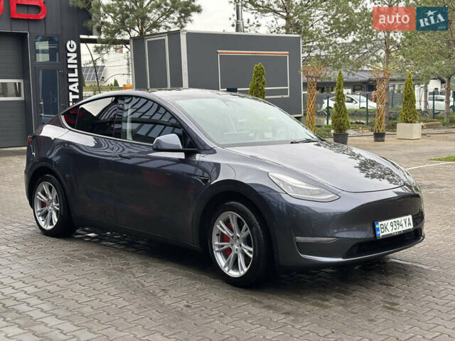 Серый Тесла Model Y, объемом двигателя 0 л и пробегом 92 тыс. км за 23500 $, фото 3 на Automoto.ua