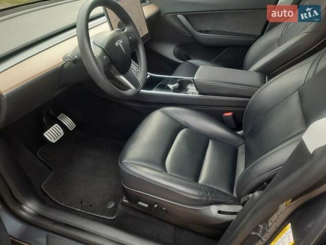 Серый Тесла Model Y, объемом двигателя 0 л и пробегом 48 тыс. км за 24900 $, фото 23 на Automoto.ua