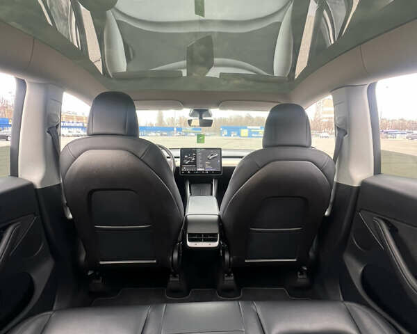 Серый Тесла Model Y, объемом двигателя 0 л и пробегом 99 тыс. км за 22300 $, фото 13 на Automoto.ua