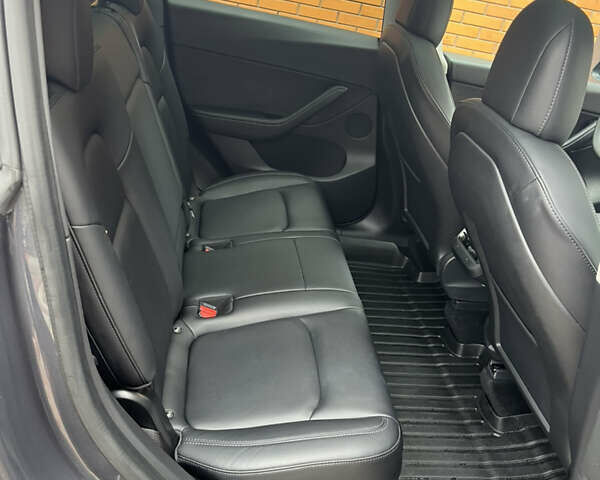 Серый Тесла Model Y, объемом двигателя 0 л и пробегом 41 тыс. км за 28500 $, фото 6 на Automoto.ua