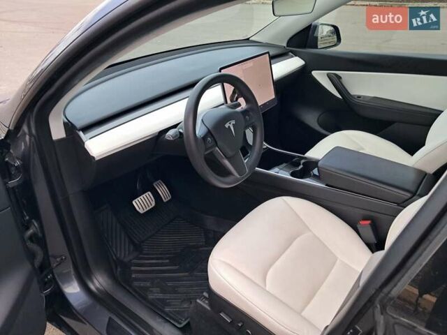 Серый Тесла Model Y, объемом двигателя 0 л и пробегом 100 тыс. км за 23500 $, фото 5 на Automoto.ua