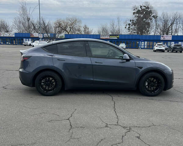 Серый Тесла Model Y, объемом двигателя 0 л и пробегом 99 тыс. км за 22300 $, фото 3 на Automoto.ua