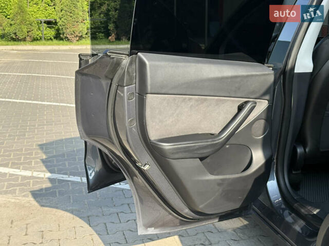 Серый Тесла Model Y, объемом двигателя 0 л и пробегом 104 тыс. км за 22500 $, фото 38 на Automoto.ua
