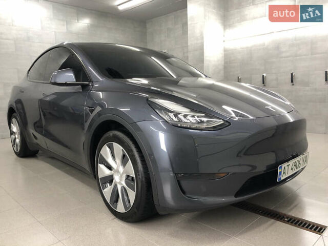 Серый Тесла Model Y, объемом двигателя 0 л и пробегом 12 тыс. км за 28500 $, фото 1 на Automoto.ua