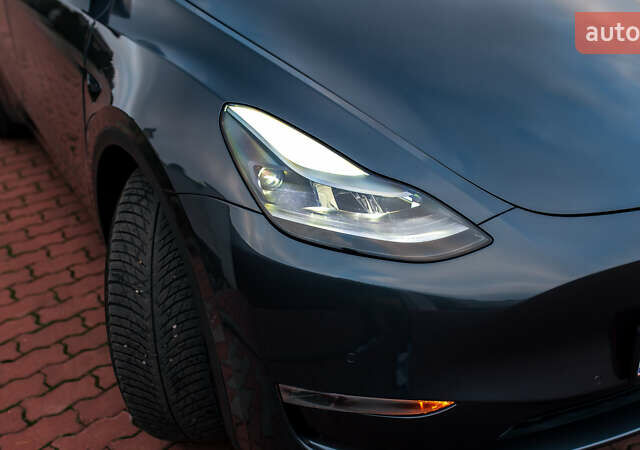 Сірий Тесла Model Y, об'ємом двигуна 0 л та пробігом 75 тис. км за 26499 $, фото 58 на Automoto.ua