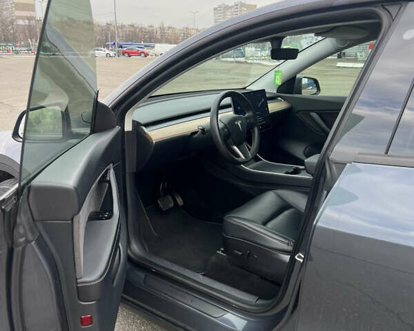 Серый Тесла Model Y, объемом двигателя 0 л и пробегом 99 тыс. км за 22300 $, фото 8 на Automoto.ua