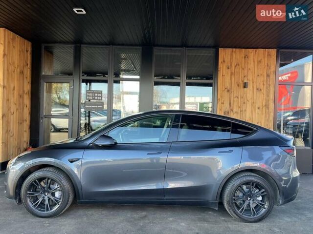 Серый Тесла Model Y, объемом двигателя 0 л и пробегом 81 тыс. км за 22099 $, фото 6 на Automoto.ua