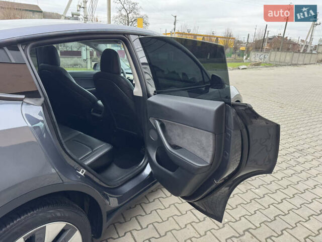 Серый Тесла Model Y, объемом двигателя 0 л и пробегом 170 тыс. км за 19500 $, фото 27 на Automoto.ua