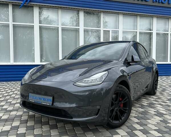 Серый Тесла Model Y, объемом двигателя 0 л и пробегом 77 тыс. км за 30555 $, фото 5 на Automoto.ua