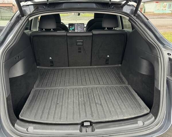 Серый Тесла Model Y, объемом двигателя 0 л и пробегом 63 тыс. км за 23900 $, фото 6 на Automoto.ua