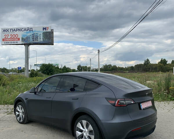 Серый Тесла Model Y, объемом двигателя 0 л и пробегом 170 тыс. км за 22900 $, фото 1 на Automoto.ua