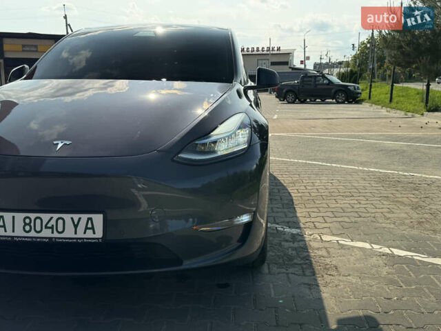 Серый Тесла Model Y, объемом двигателя 0 л и пробегом 104 тыс. км за 22500 $, фото 2 на Automoto.ua