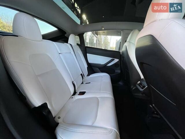 Серый Тесла Model Y, объемом двигателя 0 л и пробегом 81 тыс. км за 22099 $, фото 19 на Automoto.ua