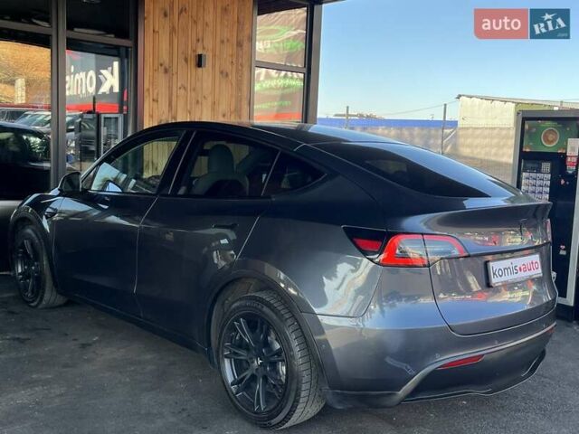 Серый Тесла Model Y, объемом двигателя 0 л и пробегом 81 тыс. км за 22099 $, фото 7 на Automoto.ua