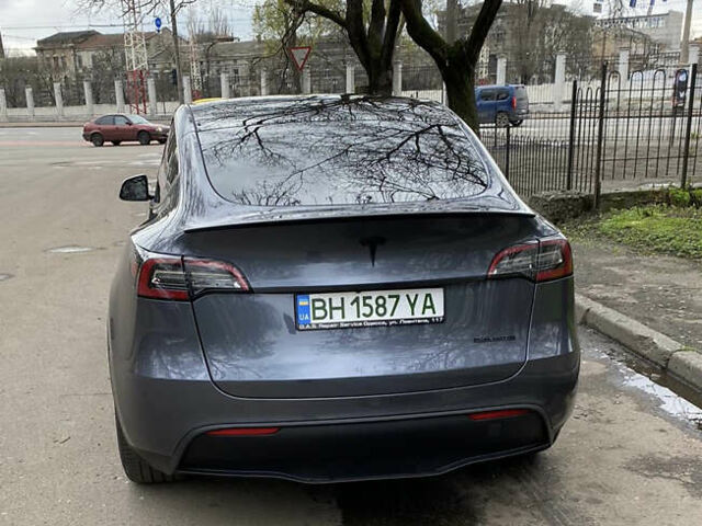 Серый Тесла Model Y, объемом двигателя 0 л и пробегом 90 тыс. км за 30000 $, фото 2 на Automoto.ua