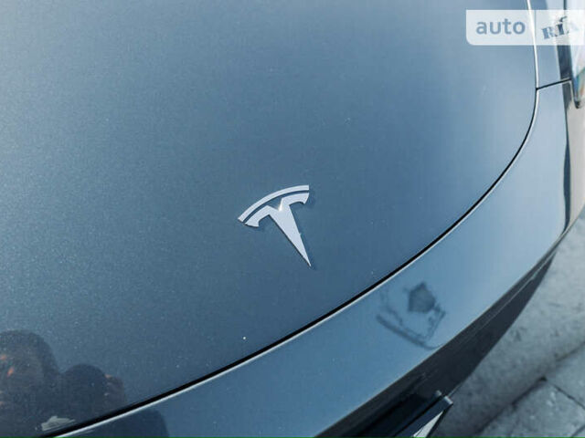 Серый Тесла Model Y, объемом двигателя 0 л и пробегом 52 тыс. км за 28200 $, фото 17 на Automoto.ua