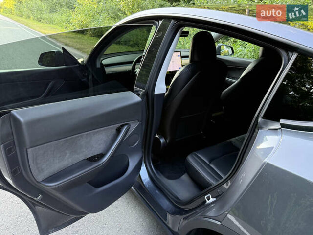 Серый Тесла Model Y, объемом двигателя 0 л и пробегом 61 тыс. км за 23200 $, фото 13 на Automoto.ua