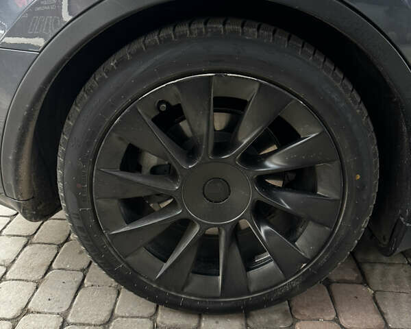 Серый Тесла Model Y, объемом двигателя 0 л и пробегом 94 тыс. км за 23000 $, фото 5 на Automoto.ua