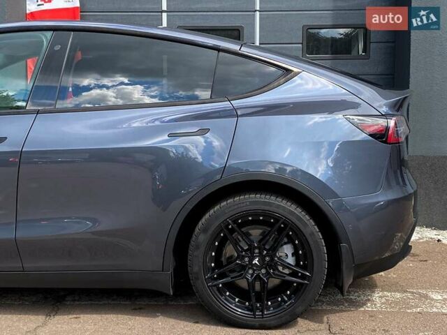 Серый Тесла Model Y, объемом двигателя 0 л и пробегом 123 тыс. км за 23999 $, фото 6 на Automoto.ua