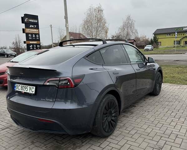 Серый Тесла Model Y, объемом двигателя 0 л и пробегом 63 тыс. км за 23900 $, фото 11 на Automoto.ua