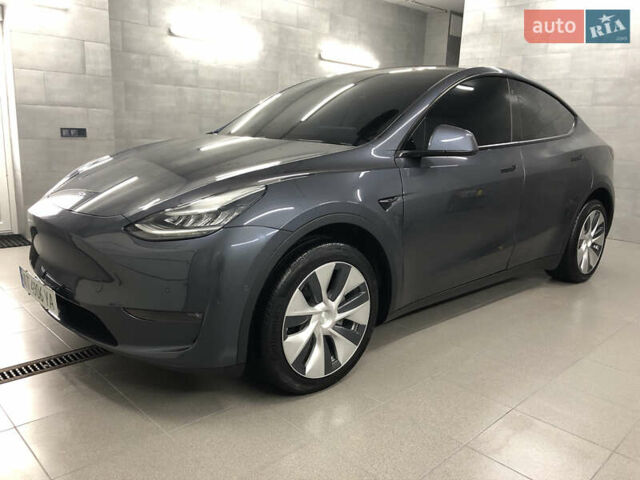 Серый Тесла Model Y, объемом двигателя 0 л и пробегом 12 тыс. км за 28500 $, фото 4 на Automoto.ua